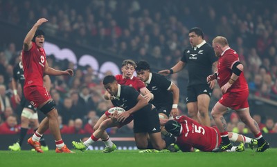 221125 - Wales v New Zealand, Quilter Nations Series - Rieko Ioane of New Zealand  is tackled by Adam Beard of Wales