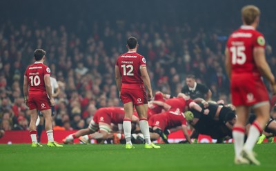 221125 - Wales v New Zealand, Quilter Nations Series - Dan Edwards of Wales, Joe Hawkins of Wales and Blair Murray of Wales watch the scrum