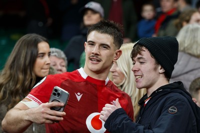 221125 - Wales v New Zealand - Quilter Nations Series - Joe Hawkins of Wales with fans at the end of the match