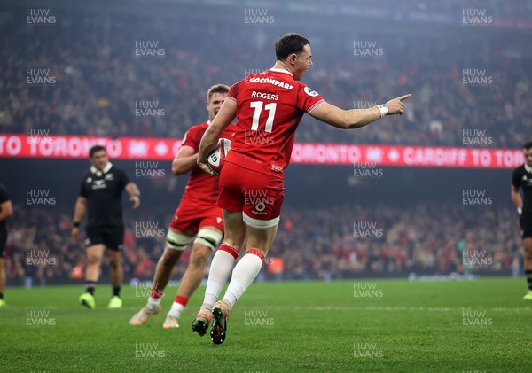221125 - Wales v New Zealand All Blacks - Quilter Nations Series - Tom Rogers of Wales celebrates scoring a try