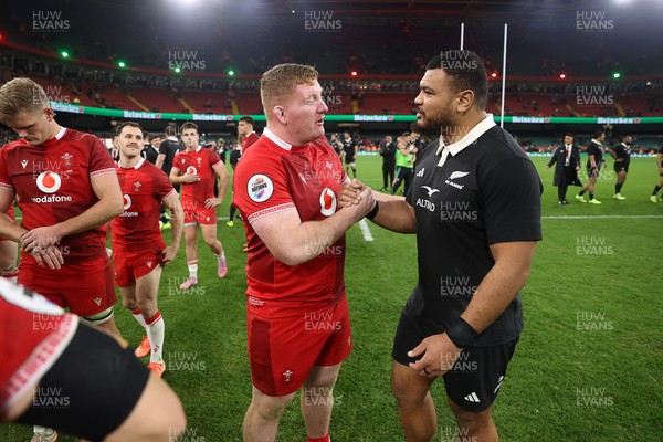 221125 - Wales v New Zealand All Blacks - Quilter Nations Series - Rhys Carre of Wales shakes hands with the opposition at full time