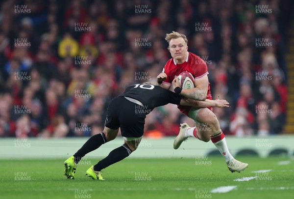 221125 - Wales v New Zealand, Quilter Nations Series -Blair Murray of Wales takes on Damian McKenzie of New Zealand  