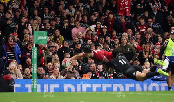 221125 - Wales v New Zealand, Quilter Nations Series - The crowd look on as Louis Rees-Zammit of Wales dives in to score try