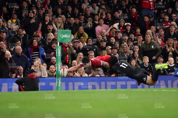 221125 - Wales v New Zealand, Quilter Nations Series - The crowd look on as Louis Rees-Zammit of Wales dives in to score try