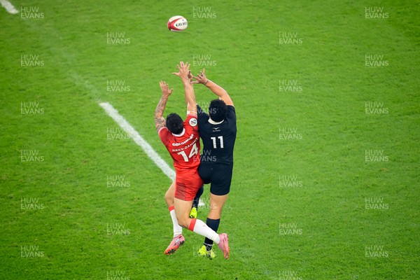 221125 - Wales v New Zealand - Quilter Nations Series - Louis Rees-Zammit of Wales and Caleb Clarke of New Zealand  