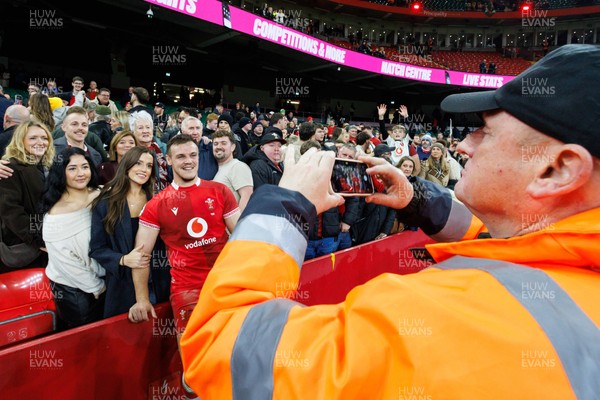 221125 - Wales v New Zealand - Quilter Nations Series - Jarrod Evans of Wales with fans at the end of the match