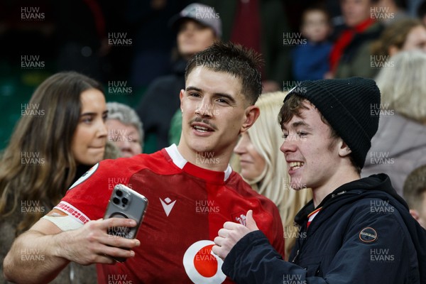 221125 - Wales v New Zealand - Quilter Nations Series - Joe Hawkins of Wales with fans at the end of the match