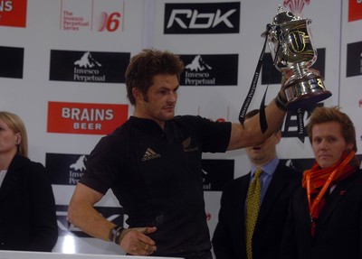 25.11.06 - Wales v New Zealand - Invesco Perpetual Series 2006 - New Zealand's Richie McCaw holds up the winners trophy at the end of the game 