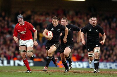 25.11.06  Wales v New Zealand All Blacks Luke McAlister breaks with full support 