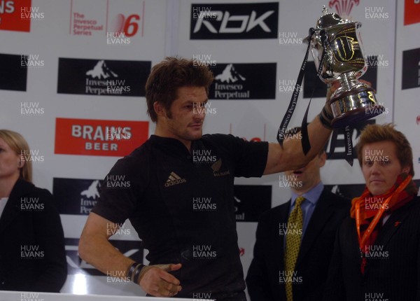 25.11.06 - Wales v New Zealand - Invesco Perpetual Series 2006 - New Zealand's Richie McCaw holds up the winners trophy at the end of the game 