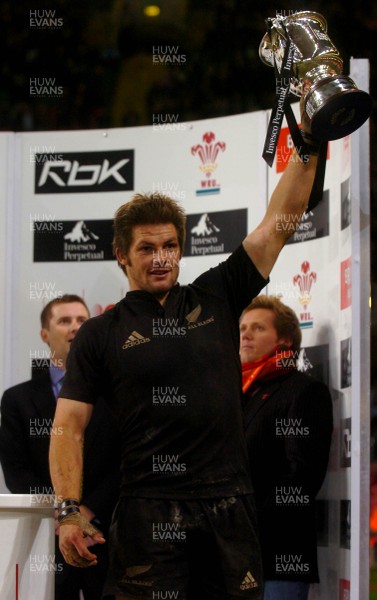 25.11.06 - Wales v New Zealand - Invesco Perpetual Series 2006 - New Zealand's Richie McCaw holds up the winners trophy at the end of the game 
