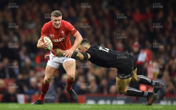 251117 - Wales v New Zealand - Under Armour Series - Rhys Priestland of Wales is tackled by Sonny Bill Williams of New Zealand