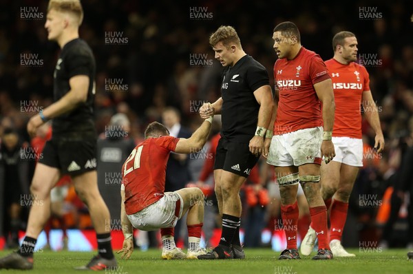 251117 - Wales v New Zealand - Under Armour Series 2017 - Gareth Davies of Wales is helped up by Nathan Harris of New Zealand