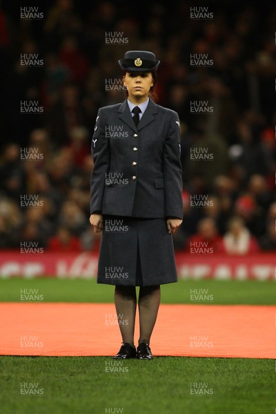 251117 Wales v New Zealand - Under Armour 2017 Series -  Officer Emily Kendrick of The RAF performs her role as flag bearer
