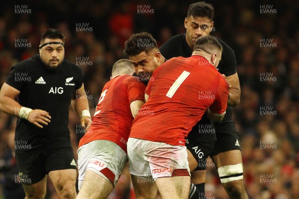 251117 Wales v New Zealand - Under Armour 2017 Series -  Kane Hames of New Zealand is tackled by Ken Owens(L) and Rob Evans of Wales