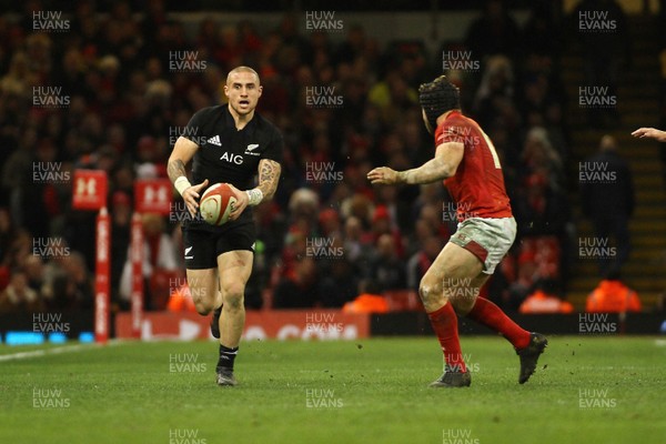 251117 Wales v New Zealand - Under Armour 2017 Series -  TJ Perenara of New Zealand takes on Leigh Halfpenny of Wales