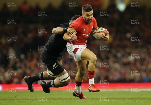 251117 - Wales v New Zealand, Under Armour 2017 Series - Rhys Webb of Wales is tackled by Patrick Tuipulotu of New Zealand
