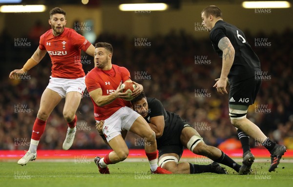 251117 - Wales v New Zealand, Under Armour 2017 Series - Rhys Webb of Wales is tackled by Patrick Tuipulotu of New Zealand