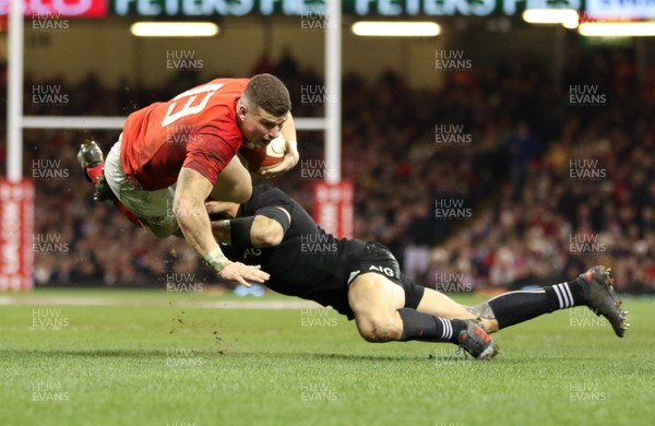 251117 - Wales v New Zealand, Under Armour 2017 Series - Scott Williams of Wales is tackled by Beauden Barrett of New Zealand