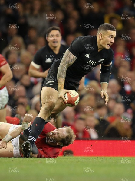 251117 - Wales v New Zealand, Under Armour 2017 Series - Sonny Bill Williams of New Zealand is tackled by Alun Wyn Jones of Wales