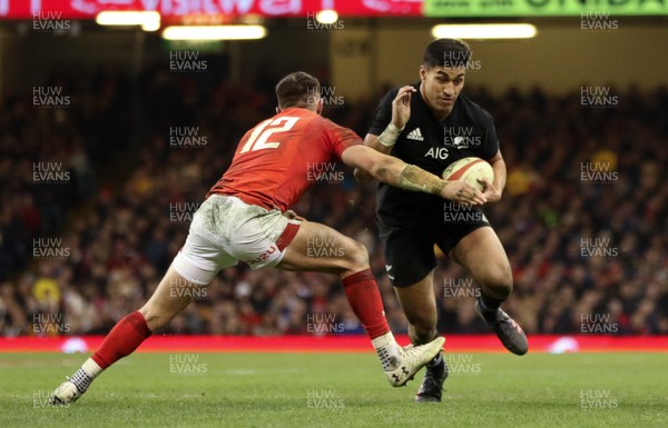 251117 - Wales v New Zealand, Under Armour 2017 Series - Rieko Ioane of New Zealand is tackled by Owen Williams of Wales
