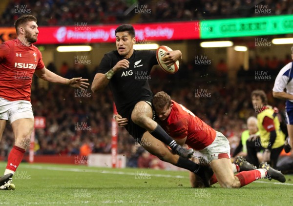 251117 - Wales v New Zealand, Under Armour 2017 Series - Rieko Ioane of New Zealand is tackled by Hallam Amos of Wales