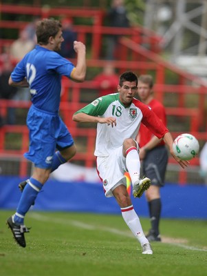 26.05.07 - Wales v New Zealand, Nationwide International Friendly Match, Wrexham Wales' Joe Ledley plays the ball down the line 