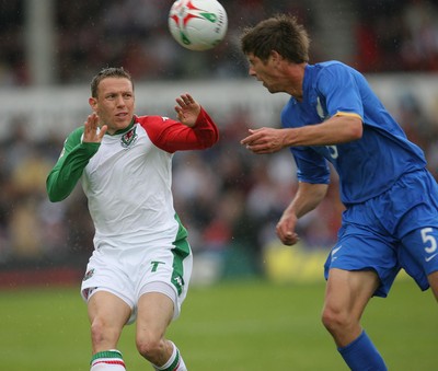 26.05.07 - Wales v New Zealand, Nationwide International Friendly Match, Wrexham New Zealand's Andy Boyens wins the ball from Wales' Craig Bellamy 