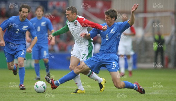 26.05.07 - Wales v New Zealand, Nationwide International Friendly Match, Wrexham Wales' Craig Bellamy is tackled by New Zealand's Andy Boyens 