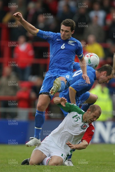 26.05.07 - Wales v New Zealand, Nationwide International Friendly Match, Wrexham New Zealand's Tim Brown wins the ball from Wales' Steve Evans 