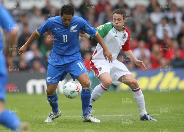26.05.07 - Wales v New Zealand, Nationwide International Friendly Match, Wrexham New Zealand's Chris James holds off Wales' Chris Gunter 