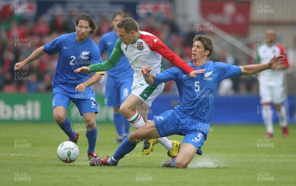 26.05.07 - Wales v New Zealand, Nationwide International Friendly Match, Wrexham Wales' Craig Bellamy is tackled by New Zealand's Andy Boyens 