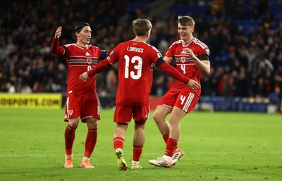 181125 - Wales v North Macedonia, FIFA World Cup European Qualifiers - Isaak Davies of Wales celebrates scoring their seventh goal with team mates