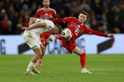 181125 - Wales v North Macedonia, FIFA World Cup European Qualifiers - Nathan Broadhead of Wales is challenged by Stefan Ashkovski of North Macedonia 