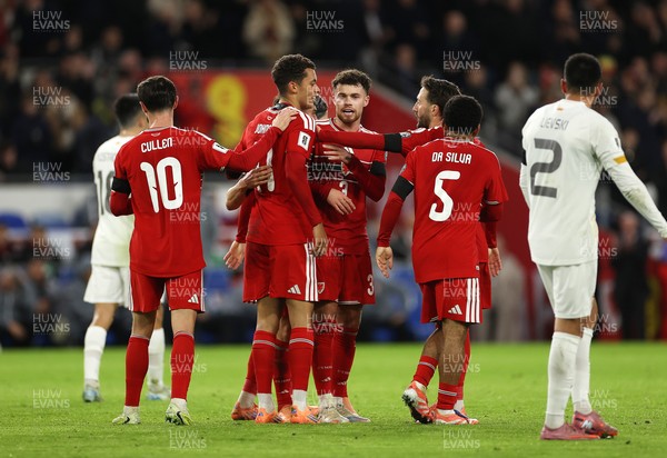 181125 - Wales v North Macedonia, FIFA World Cup European Qualifiers - Brennan Johnson of Wales celebrates scoring a goal with team mates