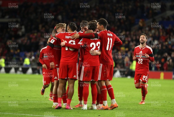 181125 - Wales v North Macedonia, FIFA World Cup European Qualifiers - Isaak Davies of Wales celebrates scoring their seventh goal with team mates