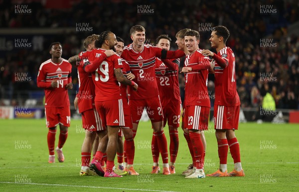 181125 - Wales v North Macedonia, FIFA World Cup European Qualifiers - Isaak Davies of Wales celebrates scoring their seventh goal with team mates