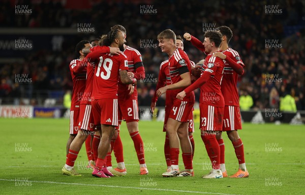 181125 - Wales v North Macedonia, FIFA World Cup European Qualifiers - Isaak Davies of Wales celebrates scoring their seventh goal with team mates