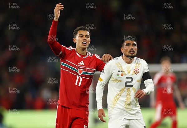 181125 - Wales v North Macedonia, FIFA World Cup European Qualifiers - Brennan Johnson of Wales and Bojan Ilievski of North Macedonia 