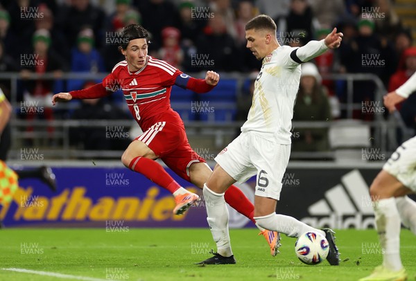 181125 - Wales v North Macedonia, FIFA World Cup European Qualifiers - Harry Wilson of Wales is challenged by Andrej Stojchevski of North Macedonia 