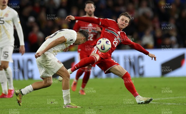 181125 - Wales v North Macedonia, FIFA World Cup European Qualifiers - Nathan Broadhead of Wales is challenged by Stefan Ashkovski of North Macedonia 