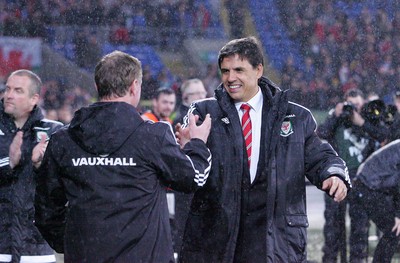 240316 - Vauxhall International Friendly - Wales v Northern Ireland -Manager Wales Chris Coleman greets of Northern Ireland Michael O'Neill