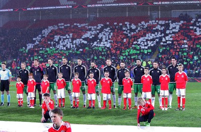 240316 - Vauxhall International Friendly - Wales v Northern Ireland -Players of Northern Ireland line up for the anthems