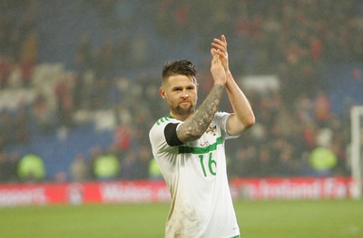 240316 - Vauxhall International Friendly - Wales v Northern Ireland -Oliver Norwood of Northern Ireland applauds the travelling fans