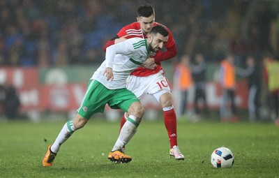 240316 - Wales v Northern Ireland, International Friendly - Tom Lawrence of Wales and Conor McLaughlin of Northern Ireland compete for the ball
