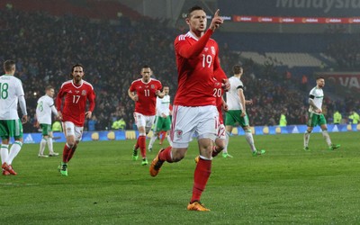 240316 - Wales v Northern Ireland, International Friendly - Simon Church of Wales  celebrates after scoring from the penalty spot