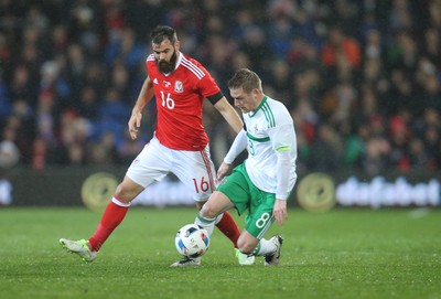 240316 - Wales v Northern Ireland, International Friendly - Steven Davis of Northern Ireland tangles with Joe Ledley of Wales