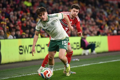 310326 - Wales v Northern Ireland - International Friendly - Neco Williams of Wales is challenged by Justin Devenny of Northern Ireland