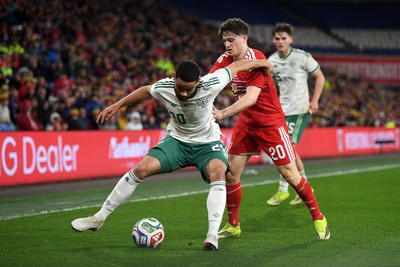 310326 - Wales v Northern Ireland - International Friendly - Daniel James of Wales is challenged by Brodie Spencer of Northern Ireland