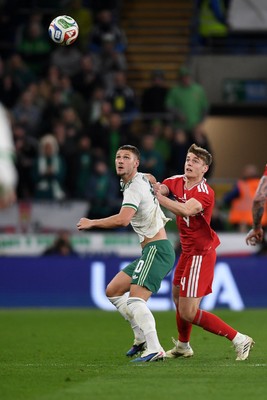 310326 - Wales v Northern Ireland - International Friendly - Dylan Lawlor of Wales is challenged by Brodie Spencer of Northern Ireland